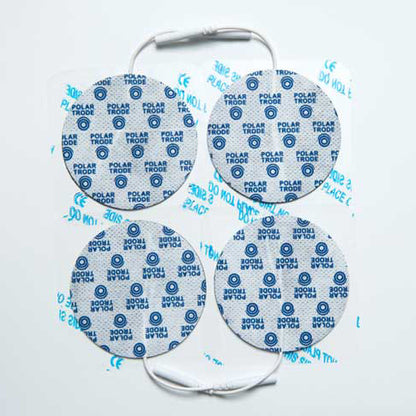 Four white polar neurostimulation electrodes with blue and red markings, arranged on a white surface.